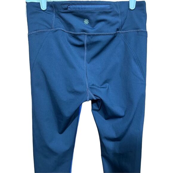 Women's Athleta Velocity Black Blue Color Block Stash Pocket Capri leggings Gym - Picture 4 of 7